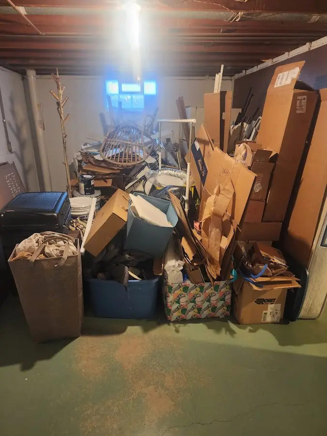 Roll-off dumpster container at job site for 20 Yard Dumpster Rental in Mora